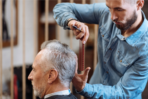 Mobile barber with an older adult client